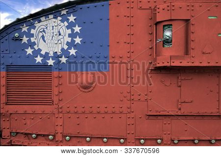 Myanmar Flag Depicted On Side Part Of Military Armored Tank Closeup. Army Forces Conceptual Backgrou