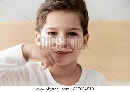 Boy Like Adult Drew Moustache On Finger Put Over Lips
