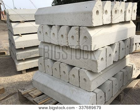 Piled Concrete Curbstones. Construction Material For Road Construction Works