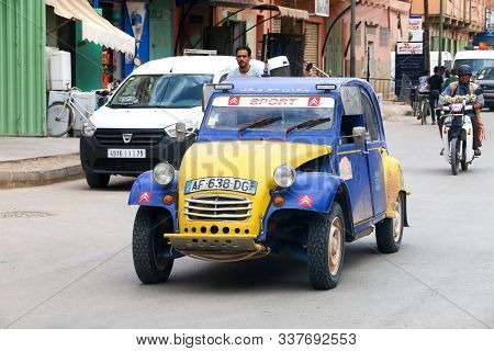 Rissani, Morocco - September 26, 2019: Bright Retro Car Citroen 2cv Takes Part In The 2cv Maroc Duna
