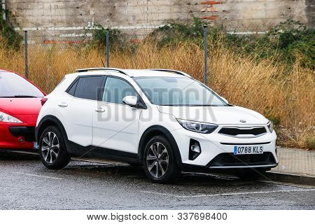 Igualada, Spain - September 10, 2019: White Motor Car Kia Stonic In The City Street.