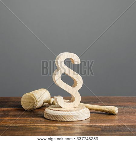 Paragraph Figurine And Judge's Gavel. Democratic Institutions, Human Rights And Property. Legislatio