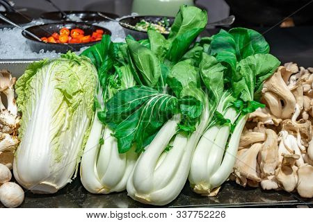 Chinese Cabbages And Differeng Dishes On Sale In The Market. Food.