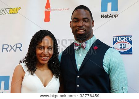 NEW YORK-MAY 31: Lauran and New York Giants Justin Tuck attend the 4th annual TuckÃÂ¢Ã?Ã?s Celebrity Billiards Tournament on May 31, 2012 in New York City.