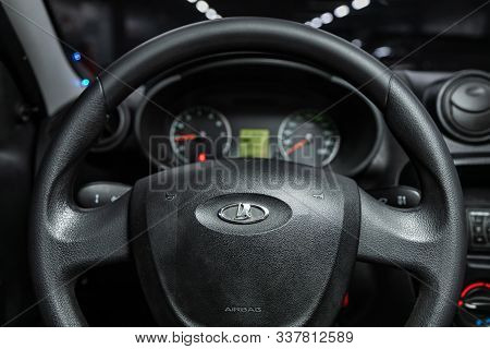 Novosibirsk, Russia - October 23, 2019:  Lada Granta, Black Car Interior - Dashboard, Player, Steeri