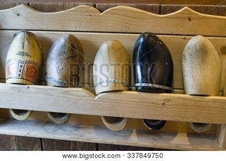 Zaanse Schans, Netherlands - 5th June, 2019: Traditional Dutch Hand Made Wooden Farmers Shoes. An Ex