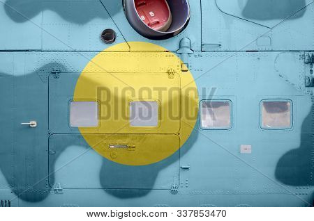 Palau Flag Depicted On Side Part Of Military Armored Helicopter Closeup. Army Forces Aircraft Concep