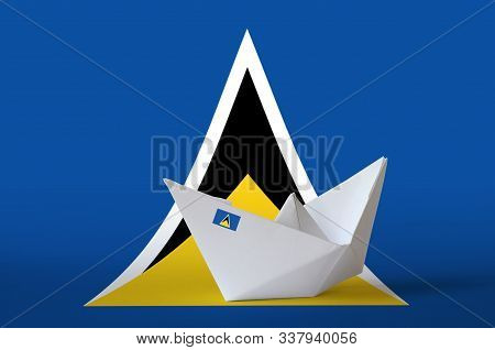 Saint Lucia Flag Depicted On Paper Origami Ship Closeup. Handmade Arts Concept