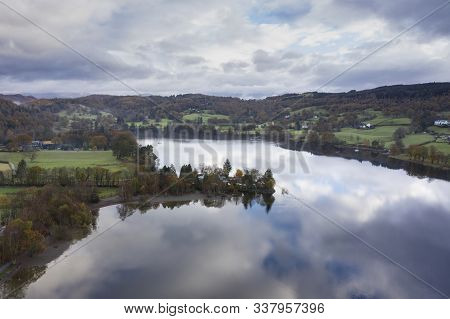 Stunning Aerial Drone Landscape Images Over Coniston Water At Sunrise On Beautiful Autumn Fall Morni