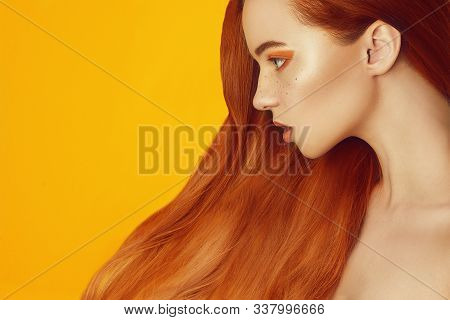 Beautiful model girl with shiny brown and straight long hair . Keratin straightening . Treatment, ca