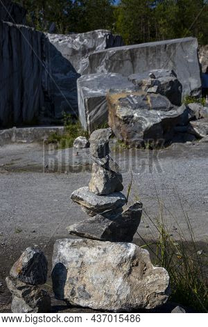 Inuksuk - A Stone Figure Of Several Stones, An Ancient Cultural Symbol In The Forest Of Karelia