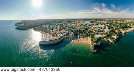 Aerial drone panoramic views of Praia Nova and Praia de Nossa beach, Algarve, Portugal