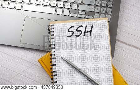 Ssh Text Written On A Notebook On The Laptop,business