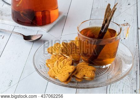 Close Up Of A Plate Of Pumpkin Cookies Served With Cinnamon Chia Tea.