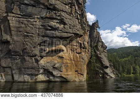 Russia. Chita Region. Coastal Rocks On The Burkal River, Whose Fast Waters Tend To The Selenga River