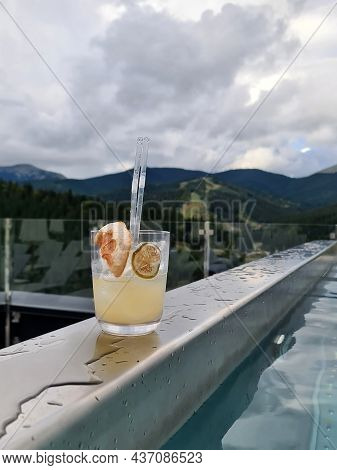 Pool With Rooftop Wiev And Cocktails With Ice