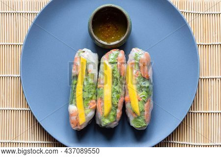 Top View Of Portion Of Nem Cuon, Vietnamese Fresh Spring Rolls On Gray Blue Plate