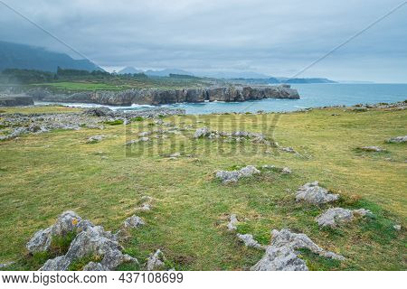 Cantabrian Coast At Famous Bufones De Pria On A Misty Autumn Day. Moody Coastal Landscape In Asturia