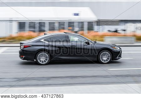 Moscow, Russia - October 2021: Black Lexus Es 350 In Motion. Lexus Seventh Generation Xz10 Driving A