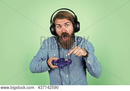 Mature Man Gamer Play Computer Games. Guy With Beard Playing Video Games. Brutal Caucasian Hipster W