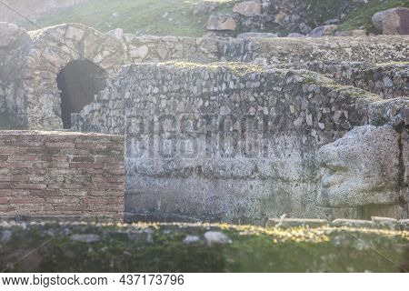 Merida, Spain - Dec 12th, 2020: Amphitheatre House Baths. Lion-shaped Fountain. Merida, Extremadura,