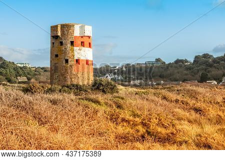 Saint Brelade British Round Coastal Defence Tower Standing In The Field, Bailiwick Of Jersey, Channe