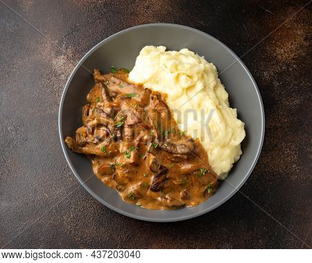 Beef Stroganoff With Mushrooms And Mashed Potatoes.