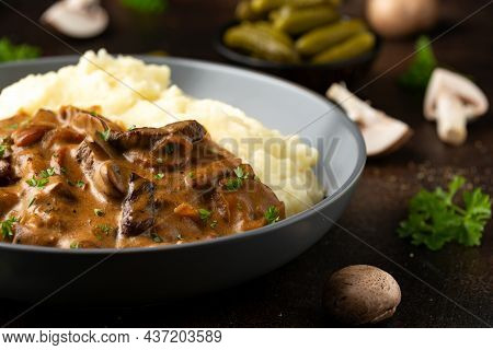 Beef Stroganoff With Mushrooms And Mashed Potatoes.