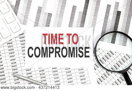 Time To Compromise Text On Paper With Calculator,magnifier ,pen On Graph Background
