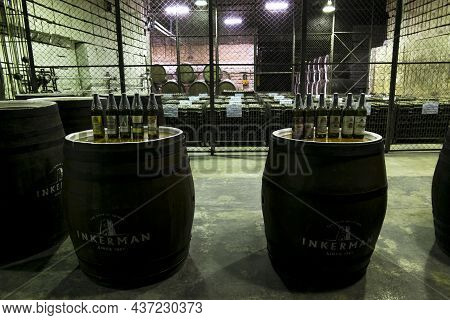 Inkerman.crimea.may 31, 2021.oak Barrels With Wine In The Cellars Of The Inkerman Winery In The Crim