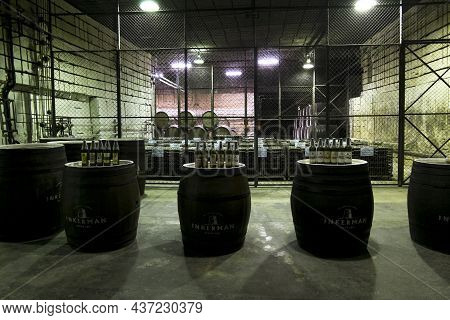 Inkerman.crimea.may 31, 2021.oak Barrels With Wine In The Cellars Of The Inkerman Winery In The Crim