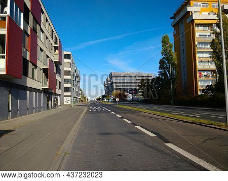 Prague, Czech Republic - October 24, 2021: Empty Straight Highway Surrounded By Modern Style Apartme
