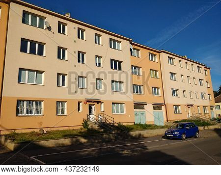 Prague, Czech Republic - October 24, 2021: Old Reconstructed Apartment Building With Yellow And Beig