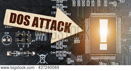 Internet And Security Concept. On The Computer Board, A Microcircuit With An Exclamation Mark And An