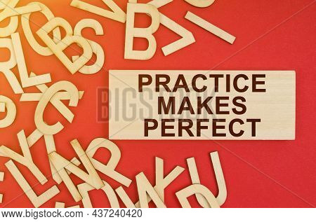 Business And Finance Concept. On A Red Background, There Are Wooden Letters And A Plate With The Ins