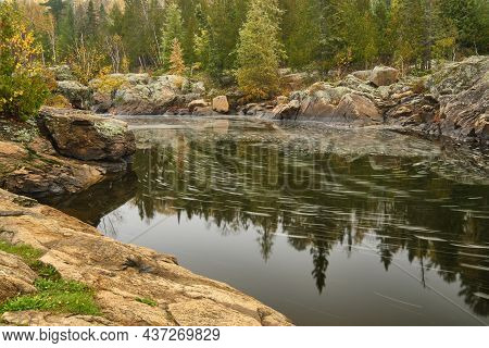 Slow Shutterspeed Photograph Of A River In The Cascades Conservation Area Near Thunder Bay Ontario.