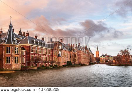 The Hague, Netherlands at the Binnenhof and moat at dusk.