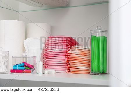 Storage Of Different Feminine Hygiene Products In Cabinet