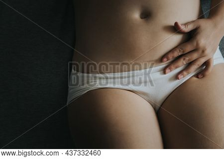Young Woman In White Panties, Caesarean Section Scar.