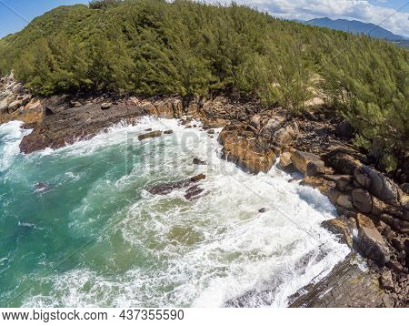 Aerial View With Waves, Rocks And Pine Trees