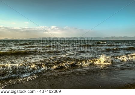 View Of The Stormy Evening Tide Near The High Mountain Lake Sevan, Located In The Mountains Of Armen