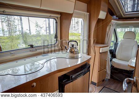 View from the window of the motorhome RV Caravan on the beautiful nature of Norway. lovatnet lake Lodal valley.