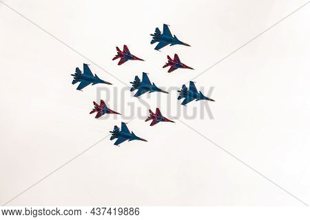 Moscow, Russia - May, 09, 2021: Diamond-shape Of 4 Mig-29 The Russian Knights And 5 Su-27 Swifts In 