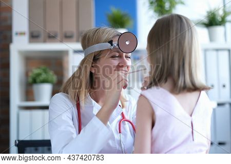 Joyful Doctor Examines The Child Nasopharynx Portrait