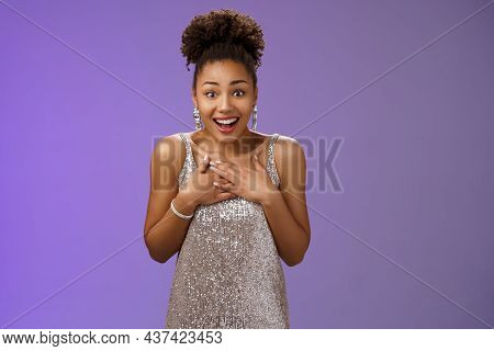 Amused Happy Grateful Charming African-american Woman In Evening Silver Dress Press Palms Chest Than