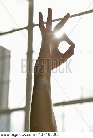 Hand Close-up On The Background Of The Window. A Gesture From Yoga