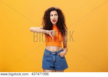 Party For Losers I Am Out. Dissatisfied Attractive Popular Girl With Curly Hairstyle In Red Lipstick