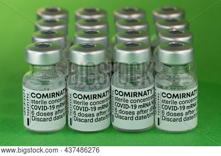 Comirnaty Biontech Pfizer Bottles Covid-19 White Background