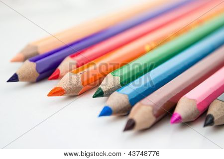 Color pencils isolated on white background close up