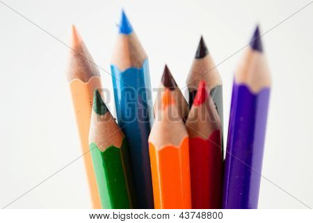 Colour pencils isolated on white background close up